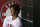Los Angeles Angels' Shohei Ohtani smiles in the dugout during the first inning of a baseball game against the Texas Rangers Monday, Sept. 6, 2021, in Anaheim, Calif. (AP Photo/Marcio Jose Sanchez)
