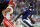 Baltimore Ravens quarterback Lamar Jackson, right, rushes past Kansas City Chiefs defensive back Daniel Sorensen in the first half of an NFL football game, Sunday, Sept. 19, 2021, in Baltimore. (AP Photo/Nick Wass)