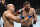 LAS VEGAS, NEVADA - SEPTEMBER 25: (L-R) Robbie Lawler and Nick Diaz trade punches in their middleweight fight during the UFC 266 event on September 25, 2021 in Las Vegas, Nevada. (Photo by Jeff Bottari/Zuffa LLC)