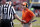 Clemson head coach Dabo Swinney, right, speaks with officials during the second half of an NCAA college football game against North Carolina State in Raleigh, N.C., Saturday, Sept. 25, 2021. (AP Photo/Karl B DeBlaker)