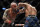LAS VEGAS, NEVADA - SEPTEMBER 25: (L-R) Alexander Volkanovski of Australia punches Brian Ortega in their UFC featherweight championship fight during the UFC 266 event on September 25, 2021 in Las Vegas, Nevada. (Photo by Chris Unger/Zuffa LLC)