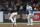 San Francisco Giants' Buster Posey (28) and Los Angeles Dodgers second baseman Trea Turner (6) watch the play at first base in the sixth inning of a baseball game in San Francisco, Saturday, Sept. 4, 2021. (AP Photo/John Hefti)