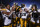 Iowa players celebrate after defeating Maryland 51-14 during an NCAA college football game, Friday, Oct. 1, 2021, in College Park, Md. (AP Photo/Julio Cortez)