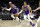 Sacramento Kings guard Tyrese Haliburton (0) goes to the basket with center Richaun Holmes, left, during the first half of a preseason NBA basketball game against the Los Angeles Clippers Wednesday, Oct. 6, 2021, in Los Angeles. (AP Photo/Alex Gallardo)