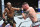 Kamaru Usman (left) hits Colby Covington at UFC 268
