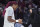 South Carolina forward Aliyah Boston, left, receives an SEC championship ring from coach Dawn Staley before the team's NCAA college basketball game against Clemson on Wednesday, Nov. 17, 2021, in Columbia, S.C. (AP Photo/Sean Rayford)