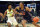 Auburn forward Jabari Smith (10) drives around South Florida forward Sam Hines Jr. (20) during the first half of an NCAA college basketball game Friday, Nov. 19, 2021, in Tampa, Fla. (AP Photo/Chris O'Meara)