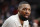 PORTLAND, OREGON - NOVEMBER 30: Damian Lillard #0 of the Portland Trail Blazers reacts after a call during action against the Detroit Pistons in the second quarter at Moda Center on November 30, 2021 in Portland, Oregon. NOTE TO USER: User expressly acknowledges and agrees that, by downloading and or using this photograph, User is consenting to the terms and conditions of the Getty Images License Agreement. (Photo by Steph Chambers/Getty Images)