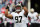 FOXBORO, MA - OCTOBER 13:  Defensive end Glenn Foster #97 of the New Orleans Saints takes the field before the start of the Saints and New England Patriots game at Gillette Stadium on October 13, 2013 in Foxboro, Massachusetts.  (Photo by Rob Carr/Getty Images)