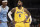 Los Angeles Lakers forward LeBron James waits next to Memphis Grizzlies guard Jarrett Culver (23) for the second half of the NBA basketball game to resume Thursday, Dec. 9, 2021, in Memphis, Tenn. (AP Photo/Nikki Boertman)