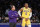 Los Angeles Lakers head coach Frank Vogel confers with guard Russell Westbrook (0) during the first half of an NBA basketball game against the Sacramento Kings in Los Angeles, Friday, Nov. 26, 2021. (AP Photo/Ringo H.W. Chiu)
