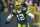 Green Bay Packers' Aaron Rodgers throws during the first half of an NFL football game against the Chicago Bears Sunday, Dec. 12, 2021, in Green Bay, Wis. (AP Photo/Matt Ludtke)