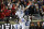 Kentucky quarterback Will Levis (7) is held up by teammate guard Austin Dotson (61) after scoring a touchdown during the first half of an NCAA college football game against Louisville in Louisville, Ky., Saturday, Nov. 27, 2021. (AP Photo/Timothy D. Easley)