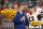 MIAMI GARDENS, FL - DECEMBER 31: ESPN announcer Chris Fowler interviews Georgia Bulldogs quarterback Stetson Bennett (13) on stage with the trophy as he celebrates defeating the Michigan Wolverines during the College Football Playoff Semifinal game at the Capital One Orange Bowl on December 31, 2021 at the Hard Rock Stadium in Miami Gardens, FL.  (Photo by Doug Murray/Icon Sportswire via Getty Images)