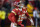 Kansas City Chiefs quarterback Patrick Mahomes (15) celebrates after throwing a touchdown pass during the first half of an NFL divisional round playoff football game against the Buffalo Bills, Sunday, Jan. 23, 2022, in Kansas City, Mo. (AP Photo/Ed Zurga)