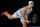 Ash Barty of Australia serves to Madison Keys of the U.S. during their semifinal match at the Australian Open tennis championships in Melbourne, Australia, Thursday, Jan. 27, 2022. (AP Photo/Hamish Blair)