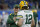 Green Bay Packers offensive coordinator Nathaniel Hackett talks with quarterback Aaron Rodgers during pregame of an NFL football game against the Detroit Lions, Sunday, Jan. 9, 2022, in Detroit. (AP Photo/Duane Burleson)