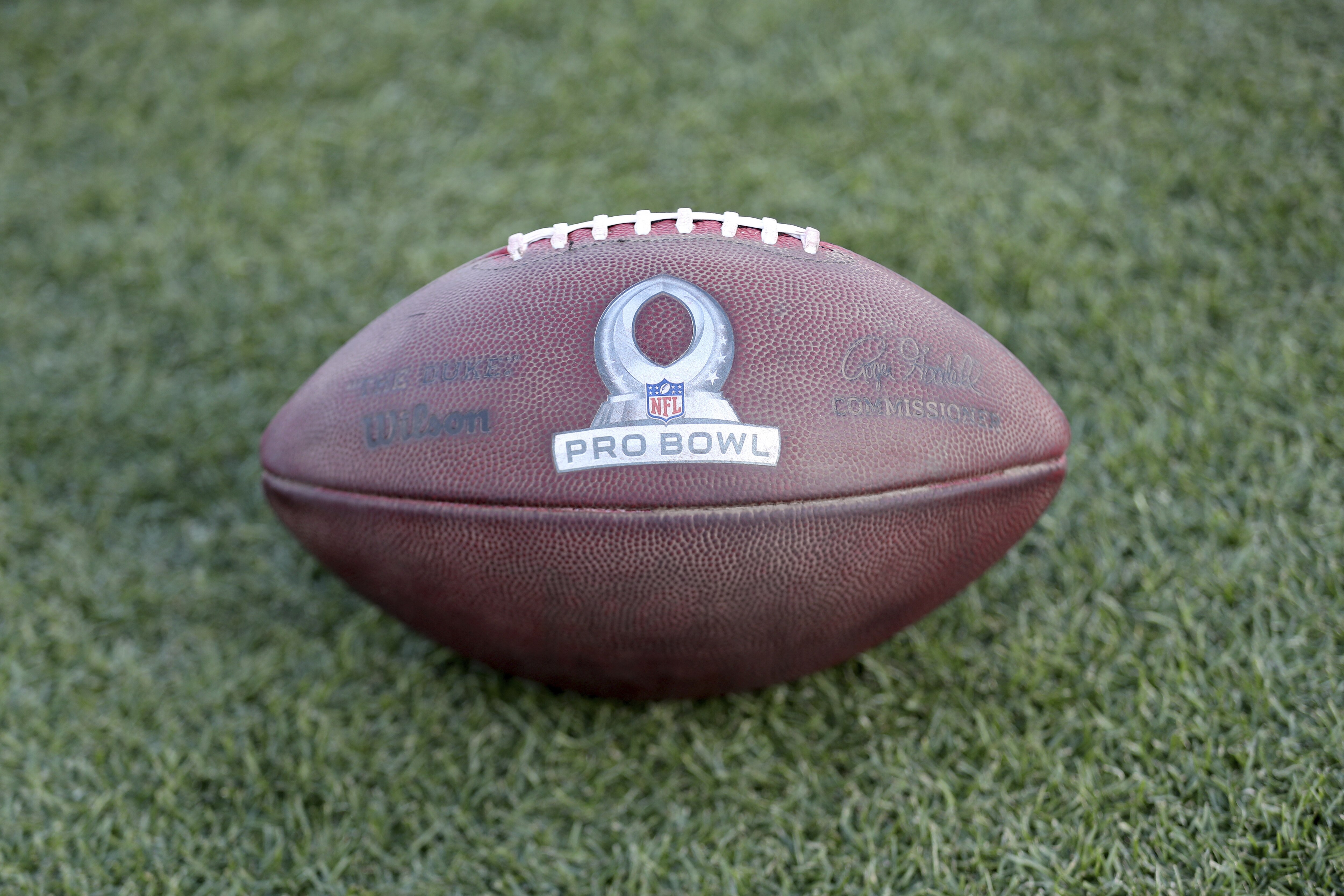 A Pro Bowl football is seen on the turf at the 2022 Pro Bowl Skills Showdown Wednesday, February 2, 2022, in Las Vegas. The event will be broadcast Thursday at 7:00 pm ET on ESPN. (Gregory Payan/AP Images for NFL)
