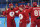 Russian Olympic Committee's Nikita Nesterov, left, celebrates his goal with teammates during a men's quarterfinal hockey game against Denmark at the 2022 Winter Olympics, Wednesday, Feb. 16, 2022, in Beijing. (AP Photo/Petr David Josek)