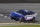 Kyle Larson crosses the finish line during qualifying for the NASCAR Daytona 500 auto race Wednesday, Feb. 16, 2022, at Daytona International Speedway in Daytona Beach, Fla. Larson took the pole position for Sunday's race. (AP Photo/Chris O'Meara)