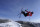 China's Eileen Gu competes during the women's halfpipe finals at the 2022 Winter Olympics, Friday, Feb. 18, 2022, in Zhangjiakou, China. (AP Photo/Gregory Bull)