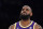 Los Angeles Lakers forward LeBron James stands on the court during the first half of an NBA basketball game against the Utah Jazz Wednesday, Feb. 16, 2022, in Los Angeles. (AP Photo/Mark J. Terrill)