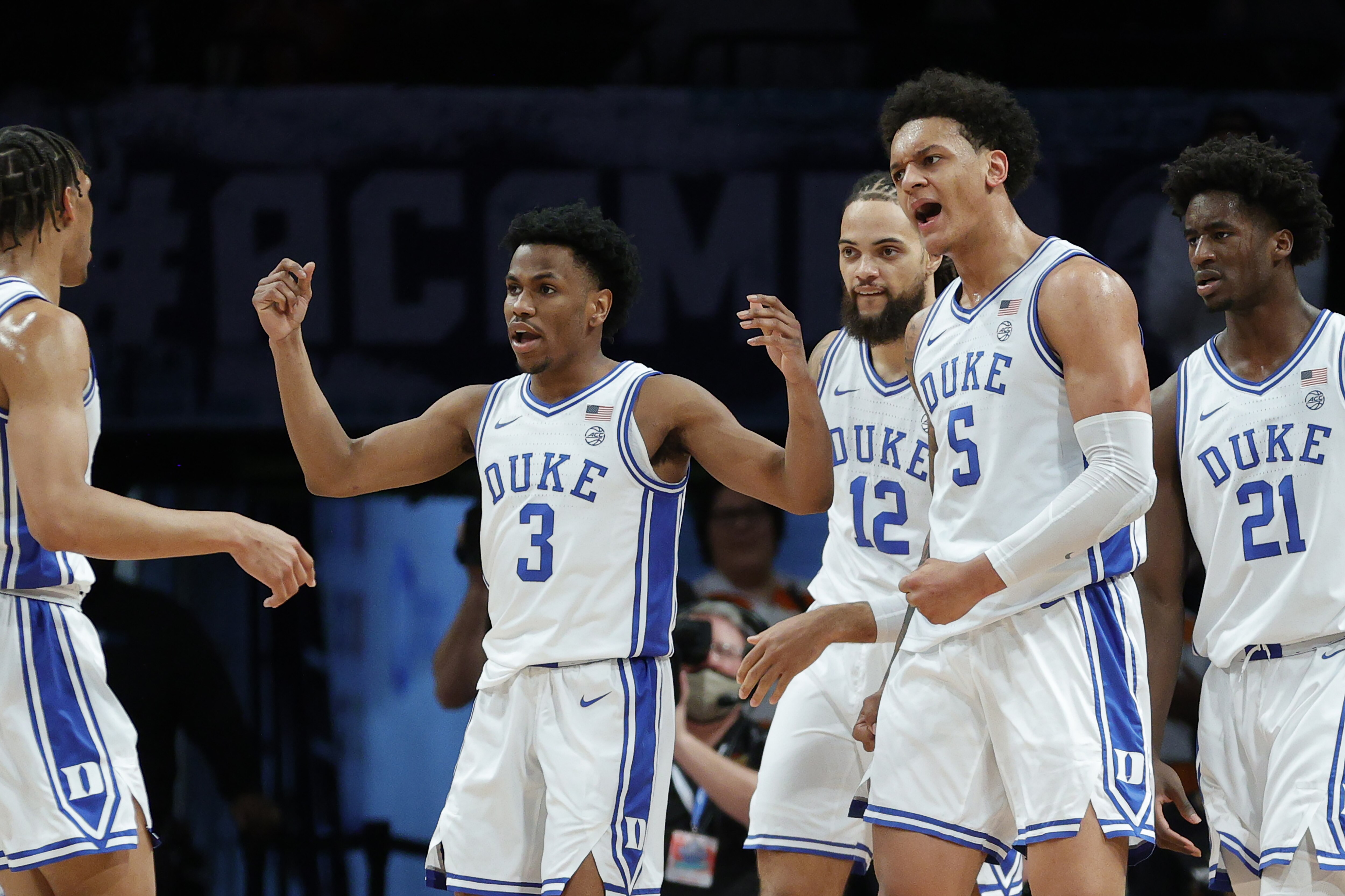 NEW YORK, NEW YORK - MARCH 11: Paolo Banchero #5, Jeremy Roach #3, Theo John #12, and AJ Griffin #21 of the Duke Blue Devils react during the first half against the Miami (Fl) Hurricanes in the 2022 Men's ACC Basketball Tournament - Semifinals at Barclays Center on March 11, 2022 in the Brooklyn borough of New York City. (Photo by Sarah Stier/Getty Images)