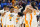 Tennessee players celebrate after defeating Kentucky in an NCAA college basketball game in the semifinal round at the Southeastern Conference tournament, Saturday, March 12, 2022, in Tampa, Fla. (AP Photo/Chris O'Meara)