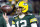 FILE - Green Bay Packers quarterback Aaron Rodgers (12) spins a football in his fingers before an NFL divisional playoff football game against the San Francisco 49ers, on Jan 22. 2022, in Green Bay, Wis. An underwhelming free agent class for quarterbacks is overshadowed by the possibility of multiple big names changing teams, most notably Aaron Rodgers. (AP Photo/Jeffrey Phelps, File)