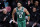 Boston Celtics forward Jayson Tatum (0) reacts after scoring during the second half of Game 3 of an NBA basketball first-round playoff series against the Brooklyn Nets, Saturday, April 23, 2022, in New York. (AP Photo/John Minchillo)