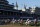 Medina Spirit, right, with John Velazquez aboard, leads the field around the first turn on the way to winning the 147th running of the Kentucky Derby at Churchill Downs, Saturday, May 1, 2021, in Louisville, Ky. (AP Photo/Michael Conroy)