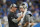 Detroit Lions head coach Dan Campbell talks with Detroit Lions quarterback Jared Goff during the first half of an NFL football game against the Minnesota Vikings, Sunday, Dec. 5, 2021, in Detroit. (AP Photo/Paul Sancya)
