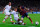 Barcelona and AC Milan do battle in the UEFA Champions League earlier this season.