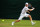 Dominic Thiem prepares to hit a backhand slice during a match at 2014 Wimbledon.