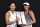 Varatchaya Wongteanchai (left) and Zhaoxuan Yang show off their Malaysian Open doubles title trophies.