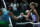 Garbine Muguruza, left, shakes hands with Karolina Pliskova after their match at the 2016 WTA Tour Finals in Singapore.