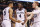 Phil Booth (5), Eric Paschall (4) and Donte DiVincenzo (10)