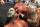 Randy Orton attempting to rip one of Jeff Hardy's earrings out.