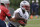 New England Patriots running back Sony Michel takes a handoff from quarterback Tom Brady.