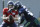 Seattle Seahawks running back Chris Carson takes a handoff from quarterback  Alex McGough.