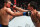 Max Holloway (right) punches Brian Ortega