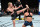 Valentina Shevchenko (left) knocks out Jessica Eye at UFC 238.