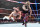 Finn Balor being brutalized by Bray Wyatt.