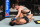 Cory Sandhagen (top) strikes Raphael Assuncao.