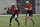 New Orleans Saints quarterbacks Jameis Winston (left) and Taysom Hill (right)