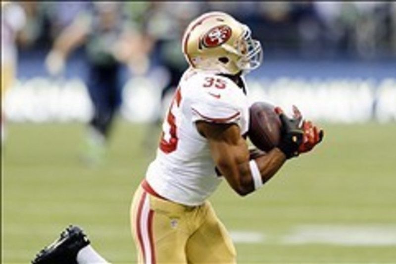 Eric Reid of the San Francisco 49ers stands on the sideline prior to