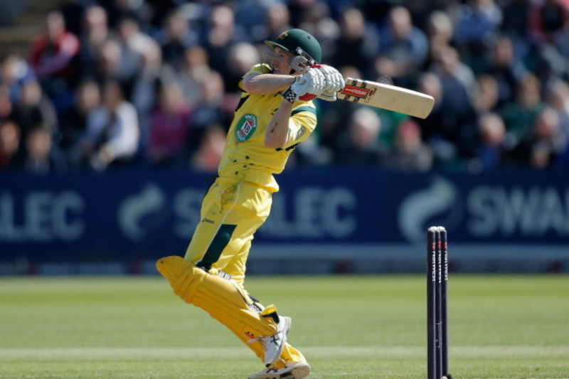 Australian cricket captain, Michael Clarke, gestures to a Louis Vuitton  cricket trunk in Sydney on Tuesday, Oct. 16, 2012. The trunk was designed  in collaboration with Clarke and will be auctioned with