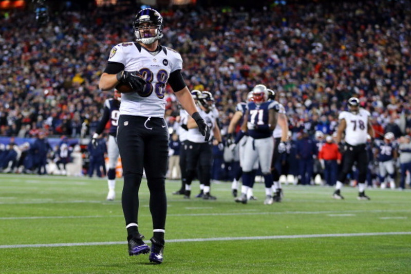 Baltimore Ravens tight end Dennis Pitta pulls in a pass against the San  Francisco 49ers during the first quarter of their pre-season game at M&T  Bank Stadium on August 7, 2014 in