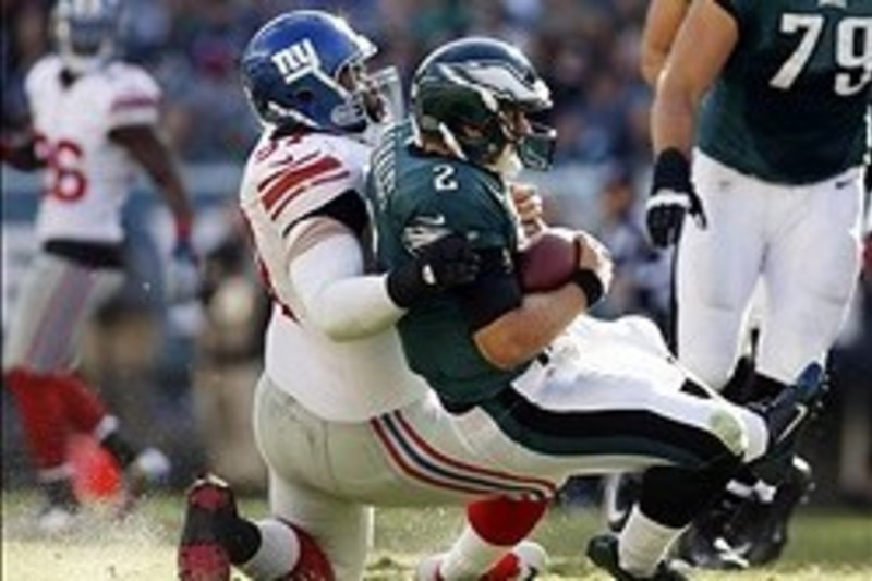 Lewis Runs Over Falcons, and Defense Runs Down Vick - The New York