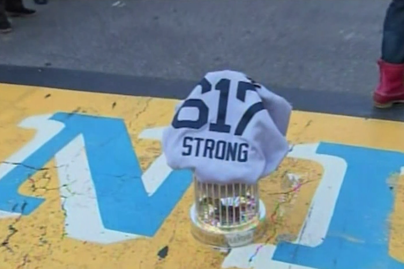 Red Sox place World Series trophy, covered in a 617 Boston Strong jersey,  at Boston Marathon finish line : r/baseball